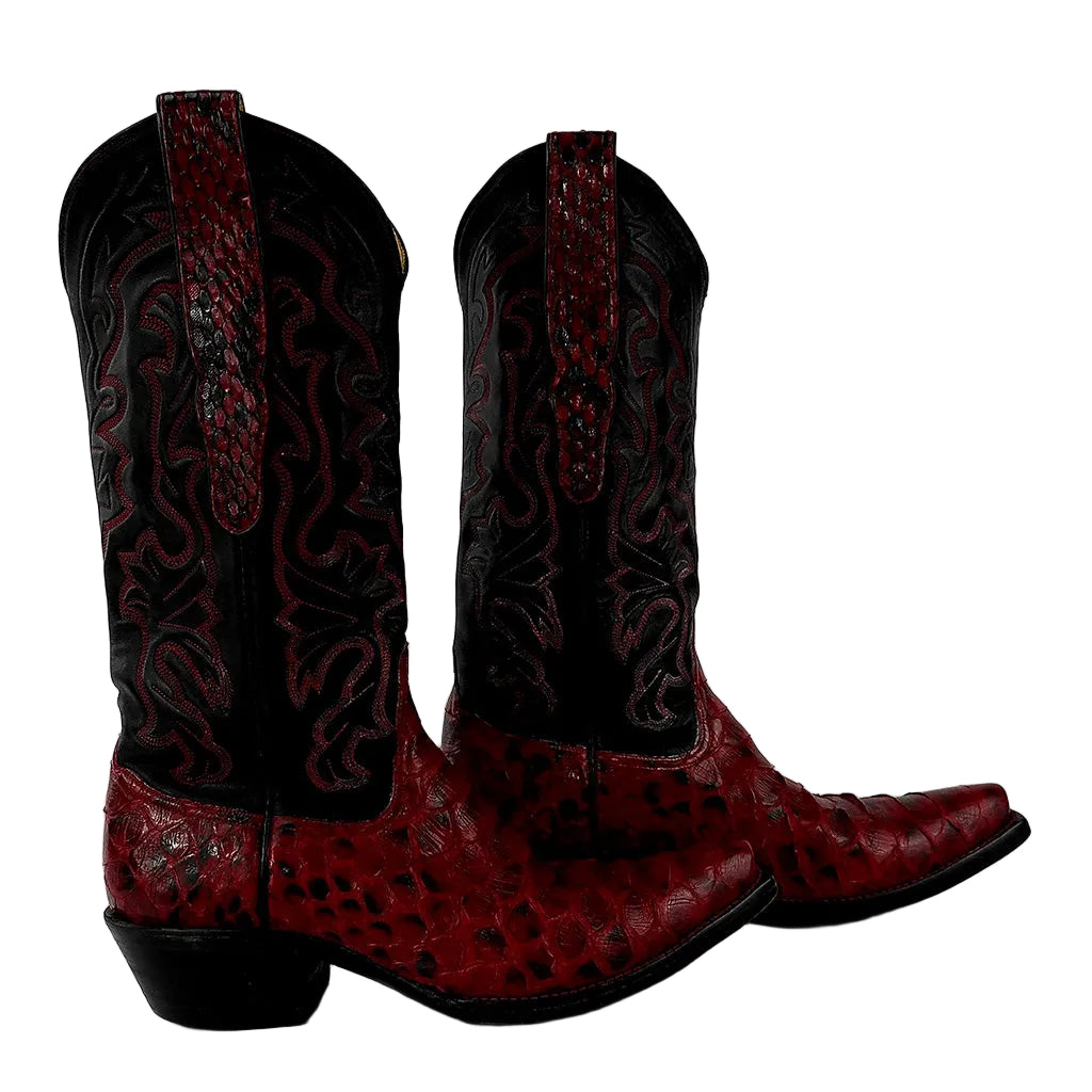A pair of cowboy boots with black shafts featuring red embroidered detailing and red alligator-textured vamps and toes, shown against a plain light gray background.