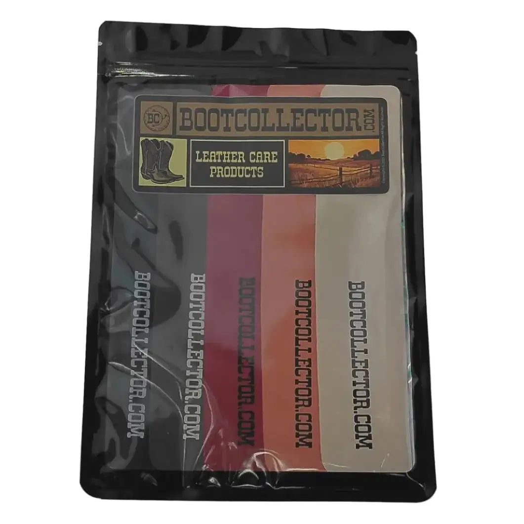 A black resealable stand-up pouch containing five applicator cloths for Boot Collector Leather Gear Products, shown on a light gray background. The cloths display black, brown, burgundy, orange, and beige color options with the brand name and website printed vertically.