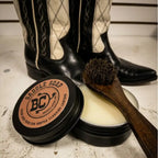 Boot Collector saddle soap and dauber brush with vintage boots from www.bootcollector.com