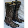A pair of dark brown western cowboy boots with tan and beige embroidered floral and geometric patterns, displayed on a light gray fabric background.